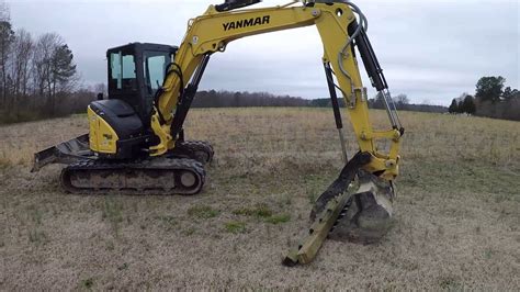 sign post removal with mini excavator|Mini Excavator Yanking Out Fence Posts .